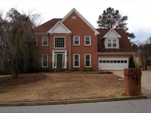 Exterior Front. Brick front traditional is set off