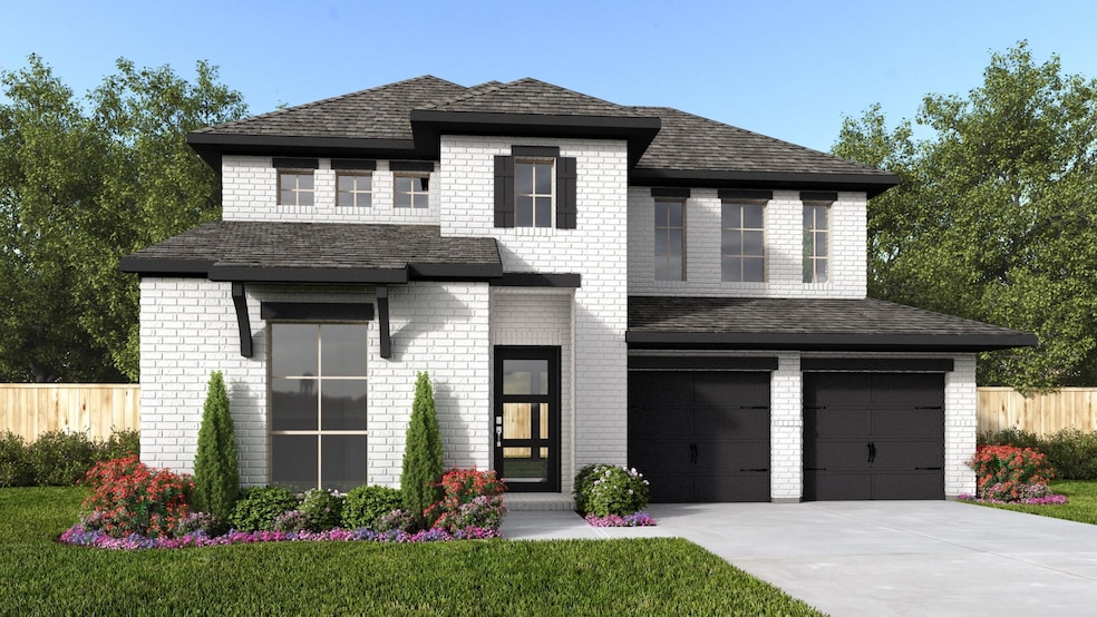 View of front facade with brick siding, concrete 