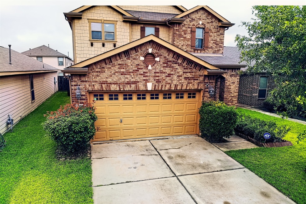 Elevated view of 2726 Urban Glen Ct.  Notice the circular vent and the keystone detail in this gorgeous home.