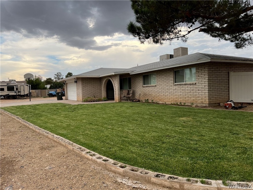 Professionally installed grass with sprinklers