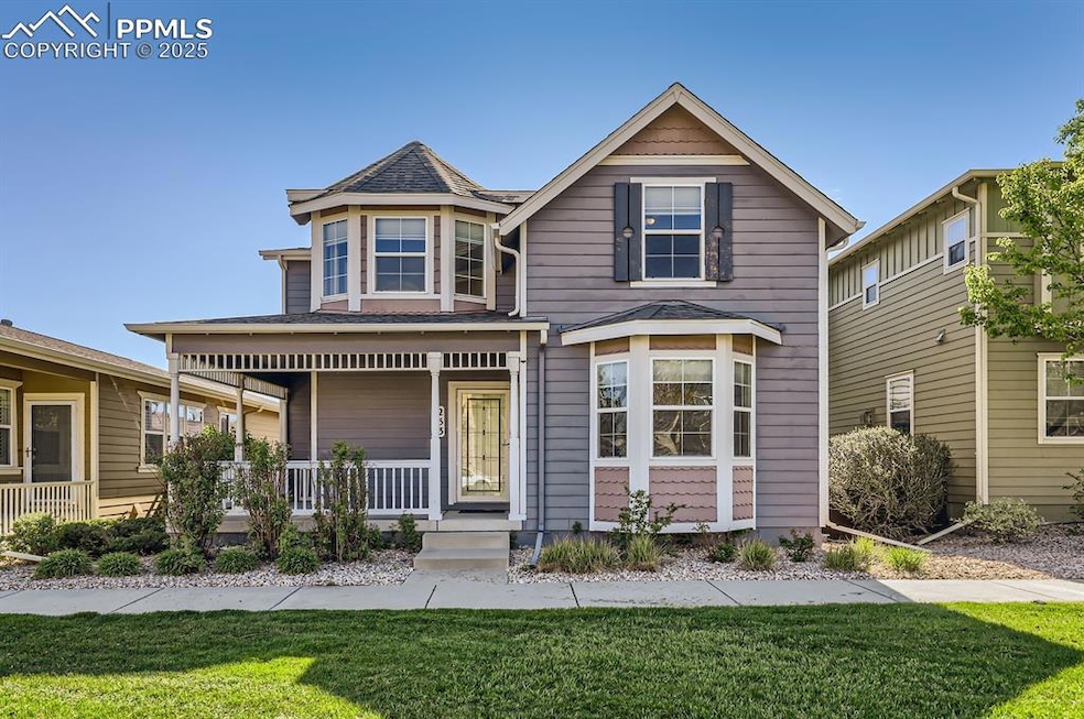 View of front of property with a porch and a front