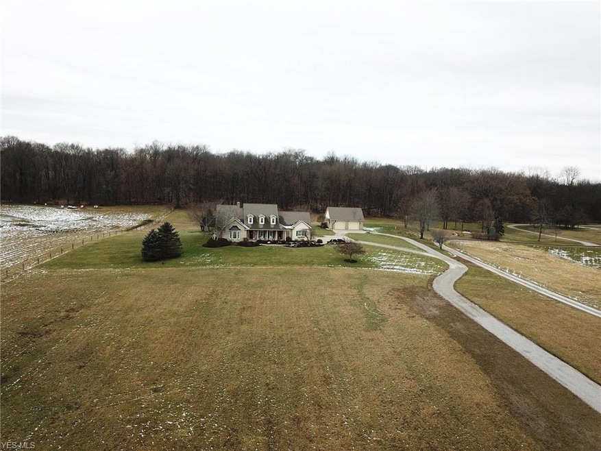 11557 Geib Ave NE Hartville 44632, street view of home and property