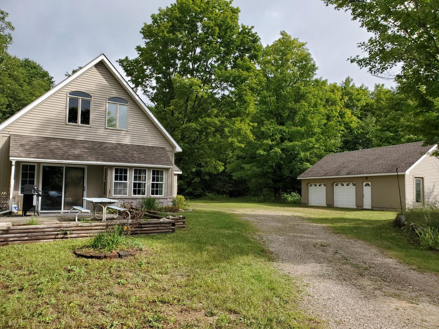 9009 Huffman Lake Rd, Vanderbilt, MI 49795 - photo 1