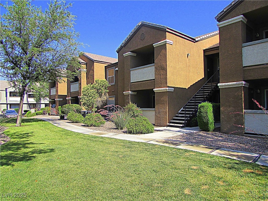 View of property featuring stairway