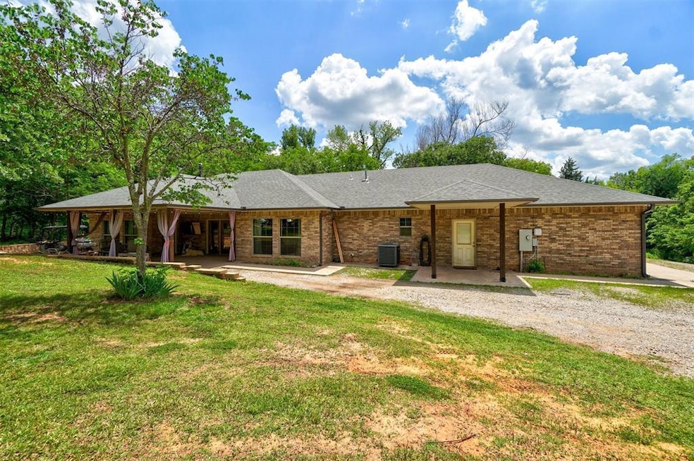 View of front of property with a patio area, centr