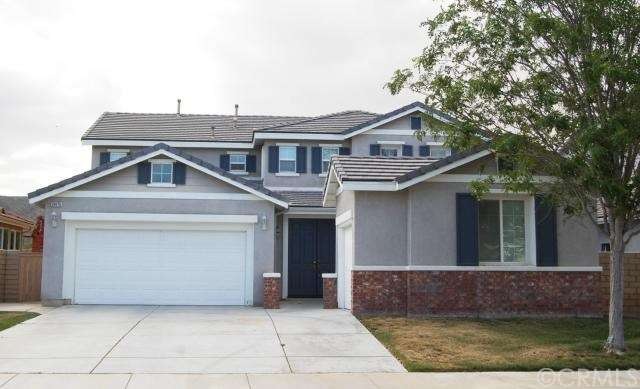 2 car garage, plus separate 1 car garage. Courtyar