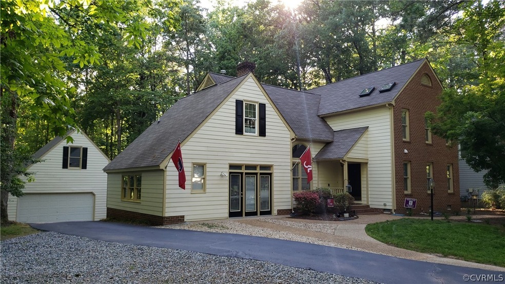 Welcome to 5730 Grove Forest Road in popular Woodl