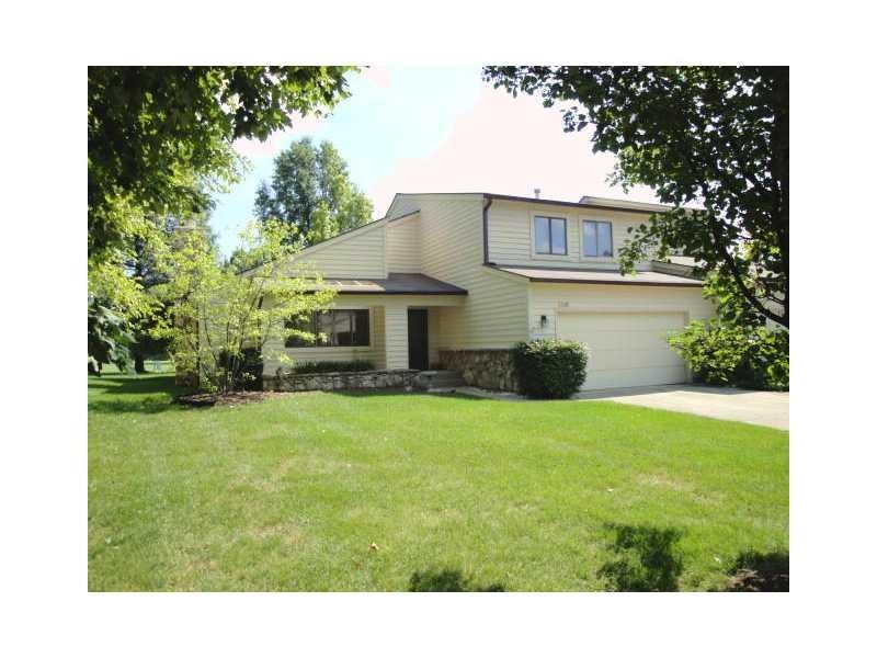 Exterior Front. Summer view of this great condo.  The Homeowners Association takes care of fertilizing the lawn and all grass cutting.  There is a sprinkler system that is taken care of by the HOA which waters your lawn, front and back.