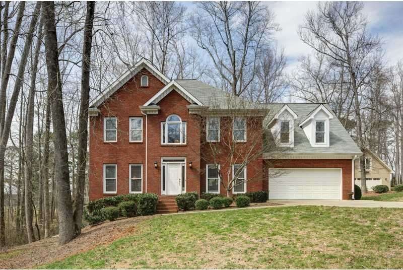 Exterior Front. Beautiful brick and Hardiplank 4 b