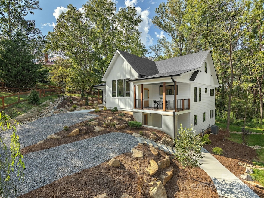 Stunning brand new construction in DOWNTOWN WEAVERVILLE on private lot for convenient and peaceful living.