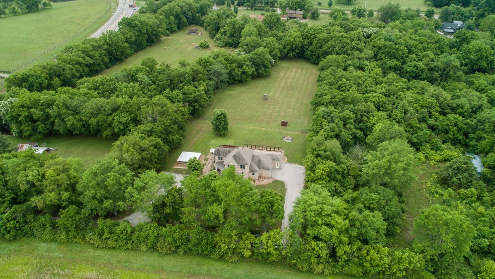 Welcome home to 1776 Lewisburg Pike! This 2.9 acre retreat includes a 4 bedroom custom, brick home with a screened porch and 3 car garage, yard fenced for animals and a dog run or garden area.