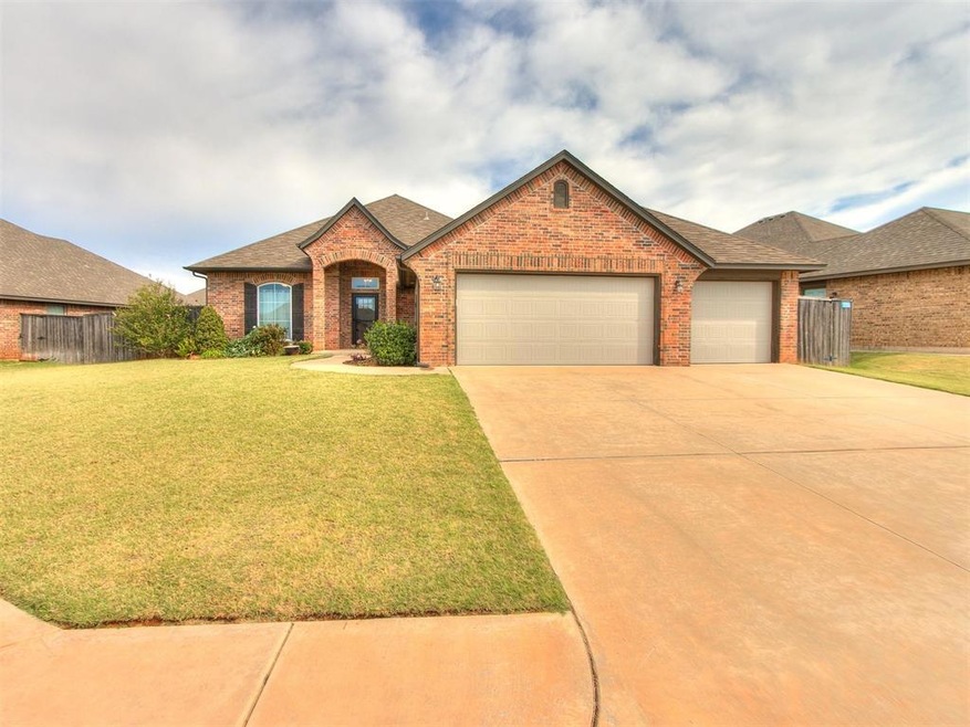 View of front of home featuring a garage and a fro
