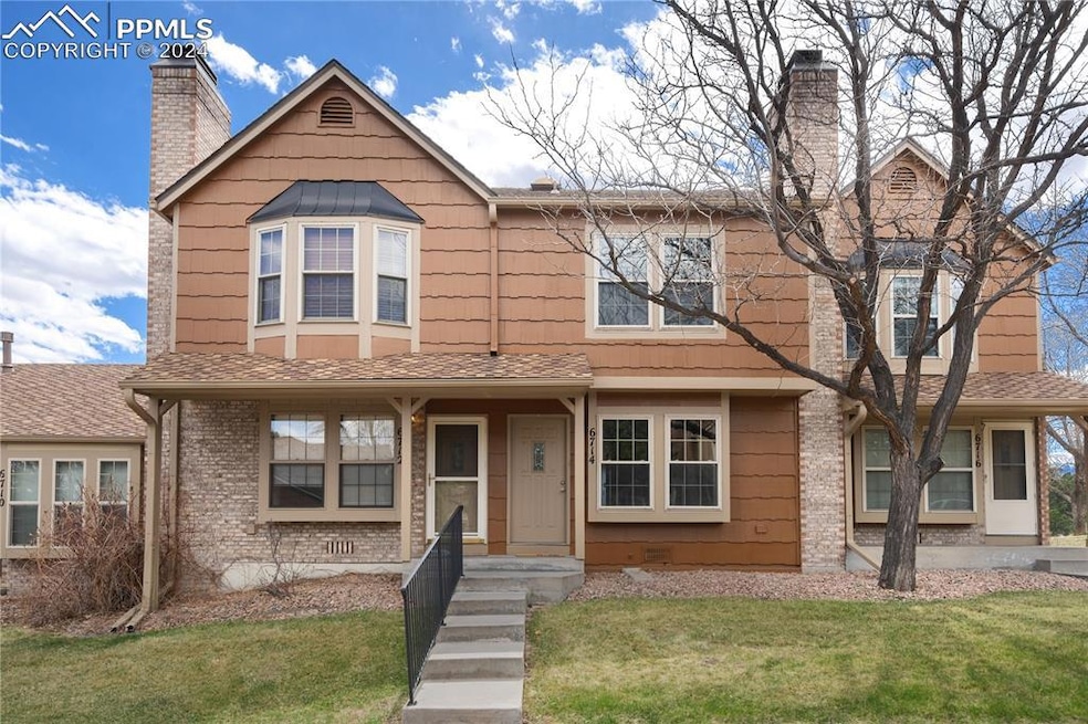 View of front of home with a front lawn