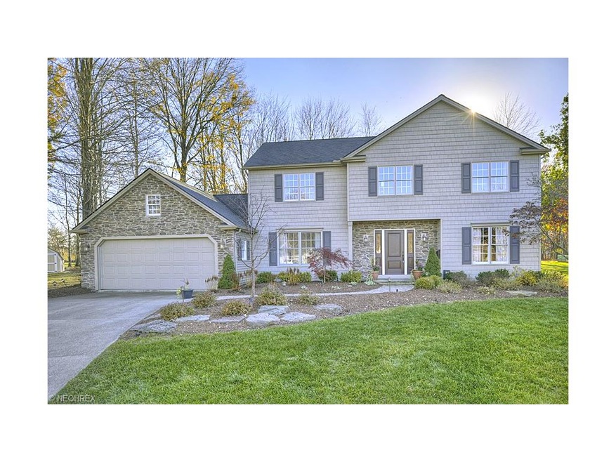 Beautiful curb appeal with a stone facade on this 