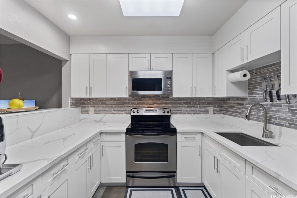 Welcome home to Kumelewai Court, this 2 bedroom & 1 bath condo with updated kitchen cabinets, counter top and flooring.