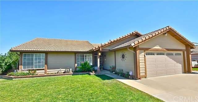 Upgraded single-story home on large corner lot wit