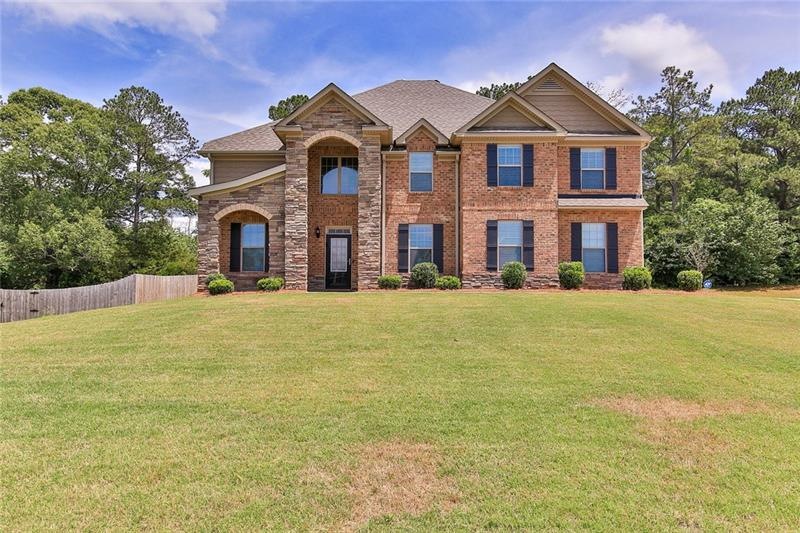 GORGEOUS BRICK HOME WITH FIVE SPACIOUS BEDROOMS IN