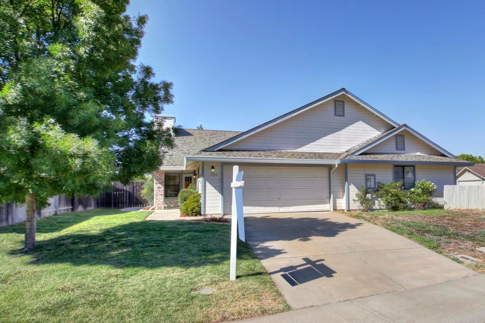 This Half-plex faces south.  2 car garage .