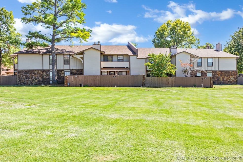 Home overlooks sweeping green space!