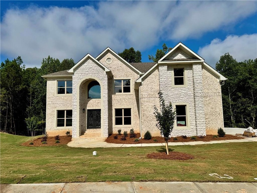 View of front of property with a front yard