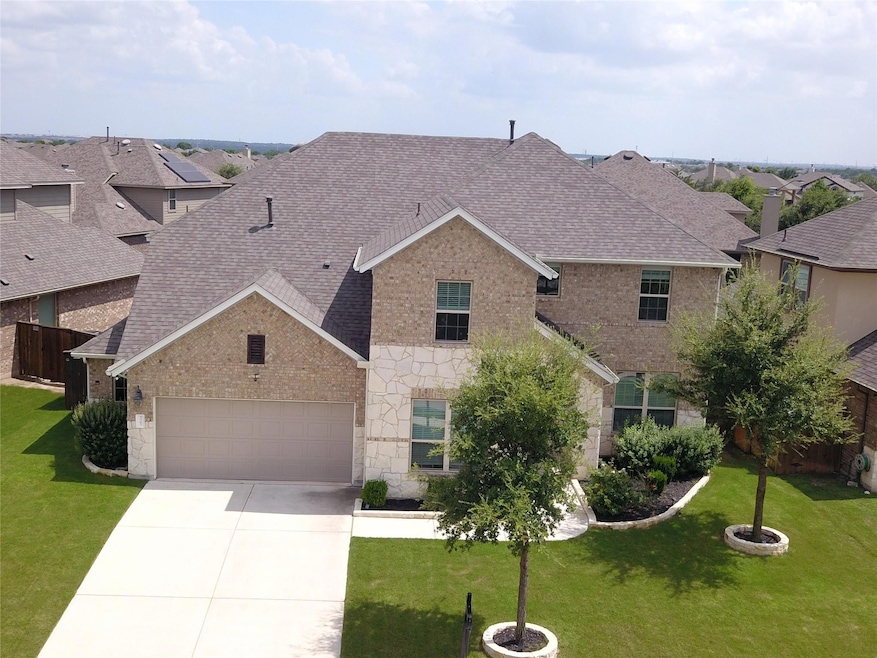 Traditional-style home with driveway, a garage, s