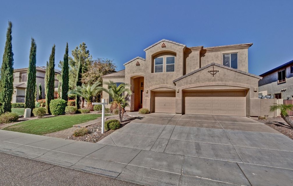 Front of Home with 3 Car Garage