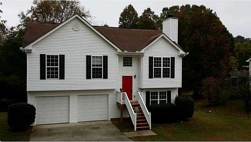 Exterior Front. Split foyer has 3 bedrooms and 2.5