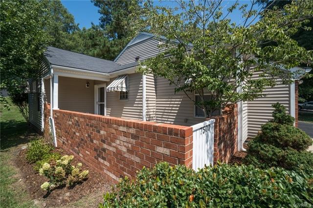 End unit with front courtyard and beautiful landsc
