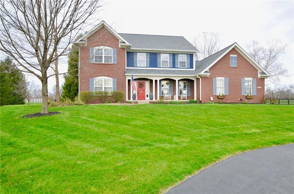 Front Elevation w/inviting front porch from winding asphalt drive.  Welcome Home!!!