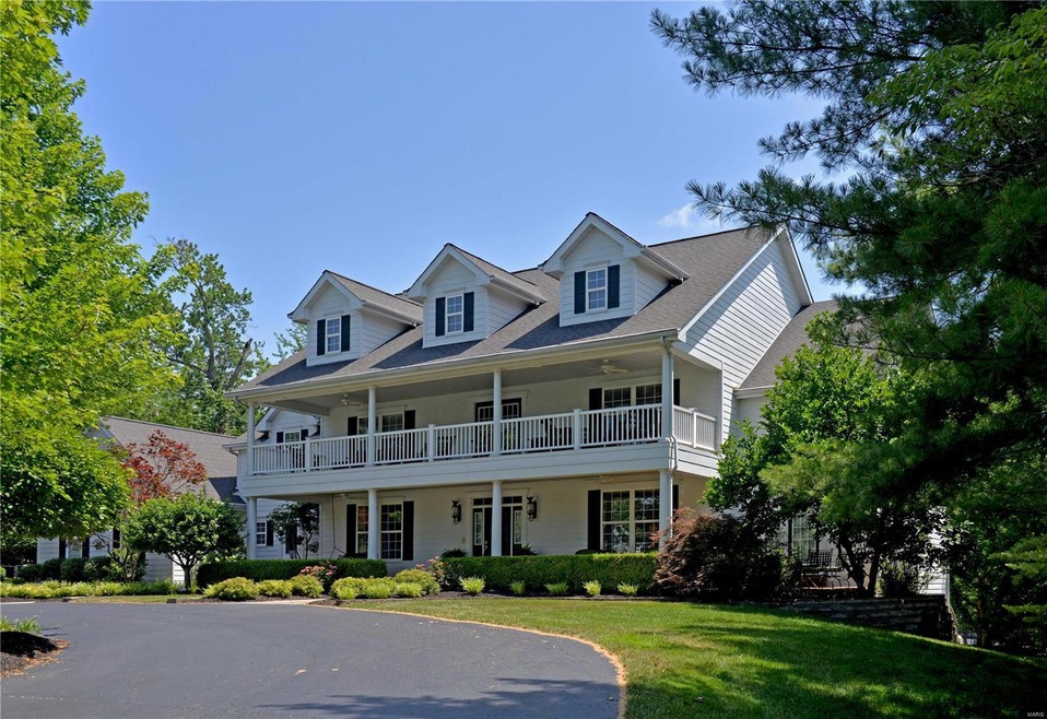 Plenty of parking for guests in the circle drive. Driveway will EASILY accommodate 8 cars or more which you will need when you entertain in this entertainers delight of a home.