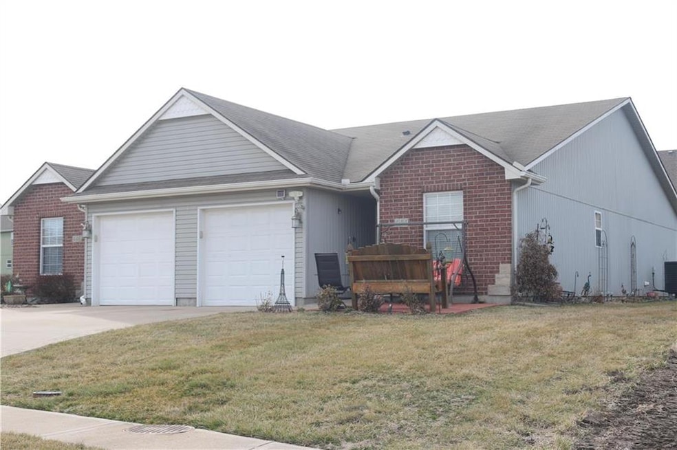 444 Kreisel Dr, Raymore, MO 64083 - photo 1