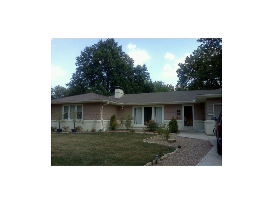 Front yard with beautiful landscaping.