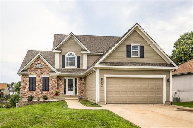 1.5 Story Home w/ wood siding and brick accent, lo