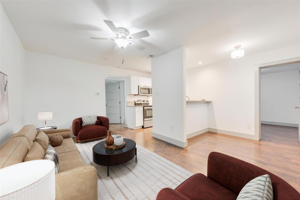 Living room featuring light wood-type flooring and