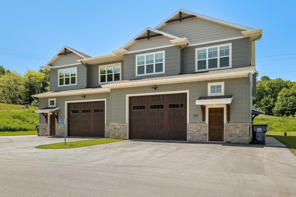 W5721 Trackside Rd unit 13, Plymouth, WI 53073 - photo 1