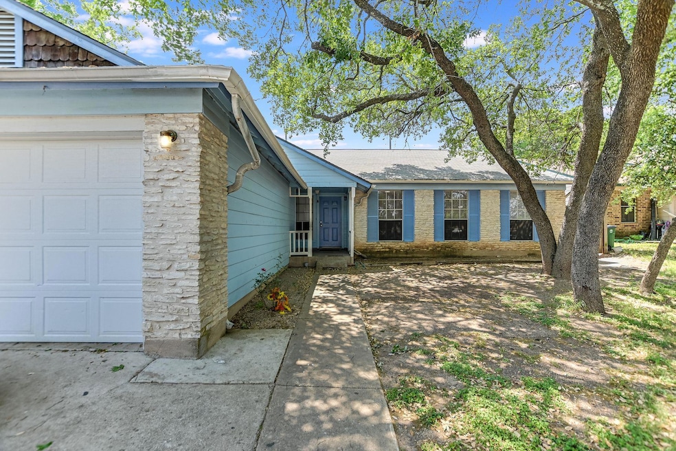 View of front of property with a garage