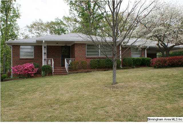 Full brick one level home on a beautiful Crestwood