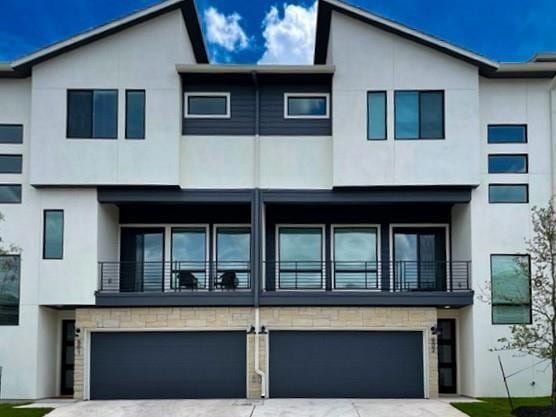 View of front of home with stucco siding