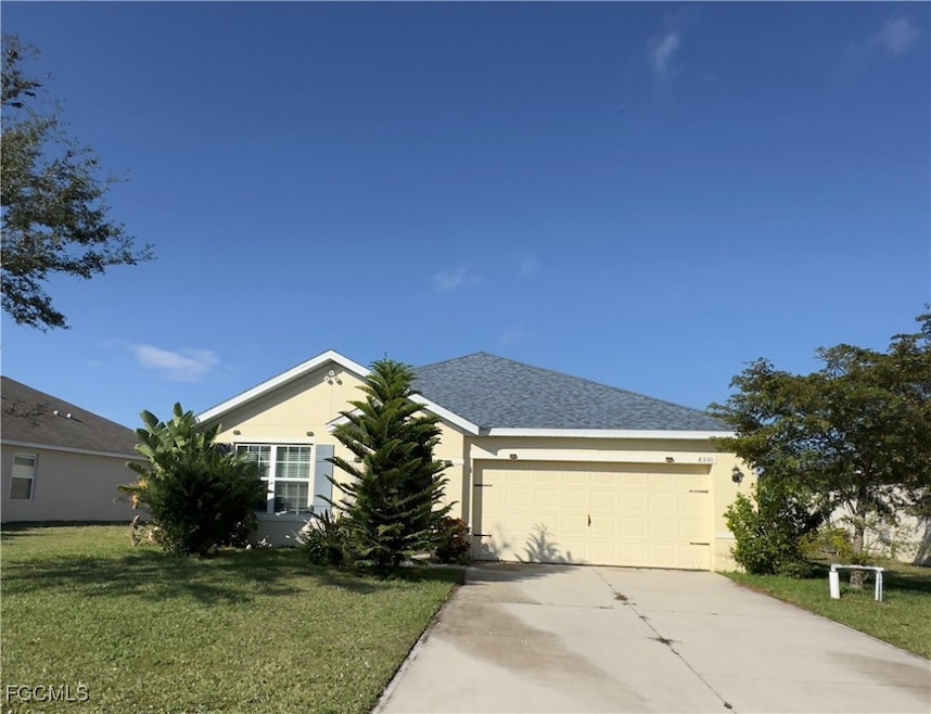8330 Tortoise Isle Ct, Lehigh Acres, FL 33972 - photo 1