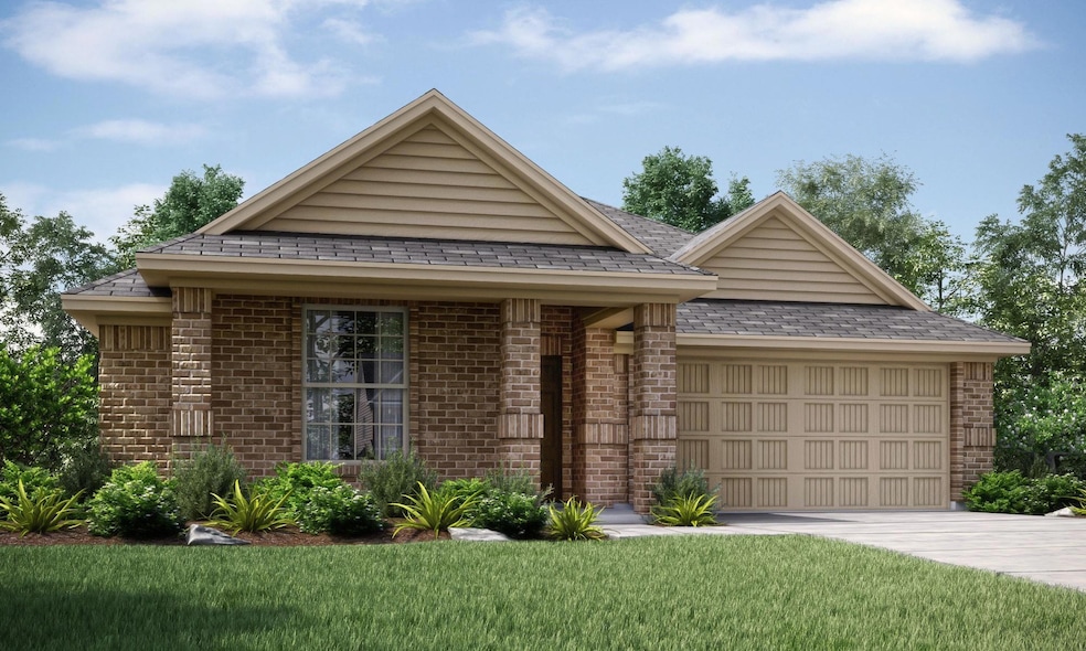 View of front of house featuring a garage and a fr