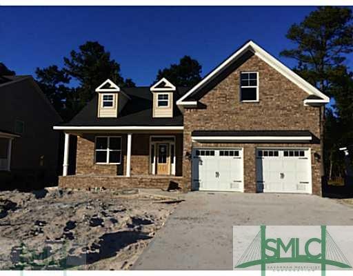 Exterior Front. Brick on all 4 sides and covered f