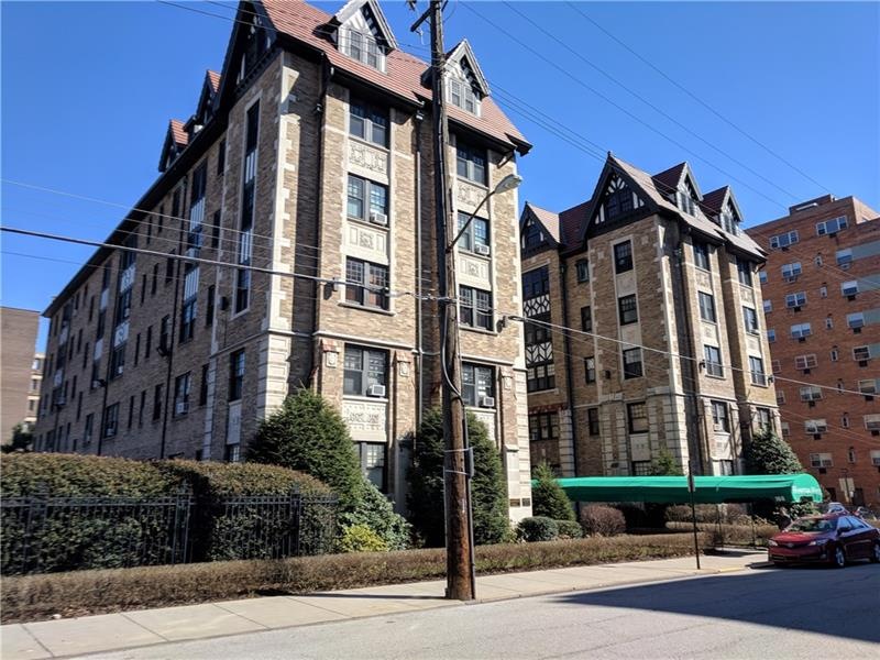 166 N Dithridge is a classic, mid rise, brick cond
