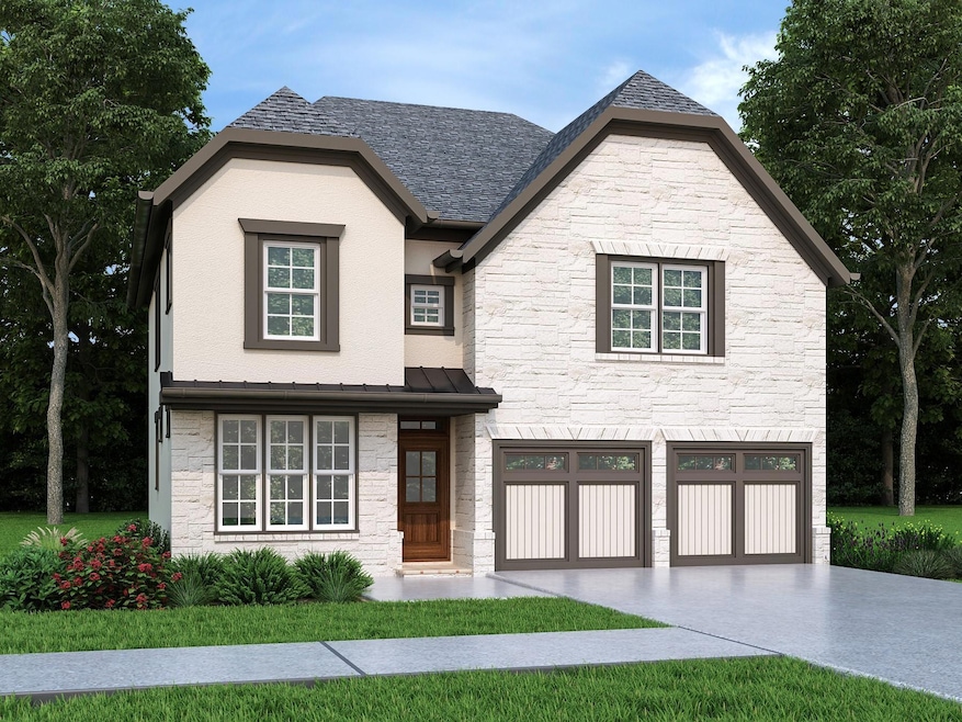 View of front of home featuring stone siding, con