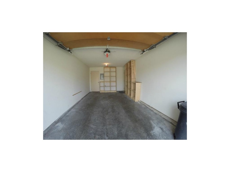 Garage With Opener (Custom Shelving)