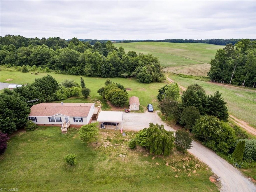 Nice home built in 2003 on 1.38 acres of land. Includes 2-bay detached carport and storage building with power.