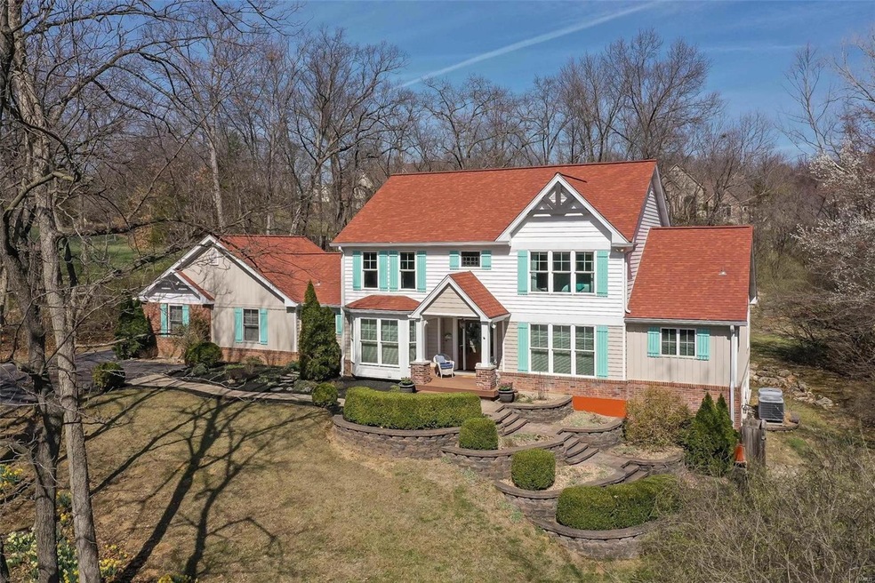 Welcome to 12385 Topping Manor Drive in beautiful and desired Town and Country Missouri.