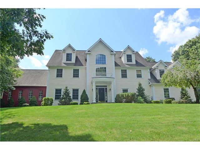 Welcome to this private, spacious 12 room Colonial