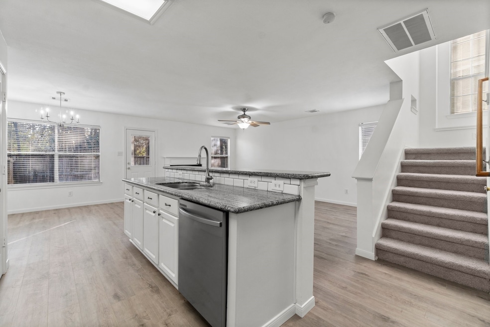 This photo showcases a modern, open-concept kitche