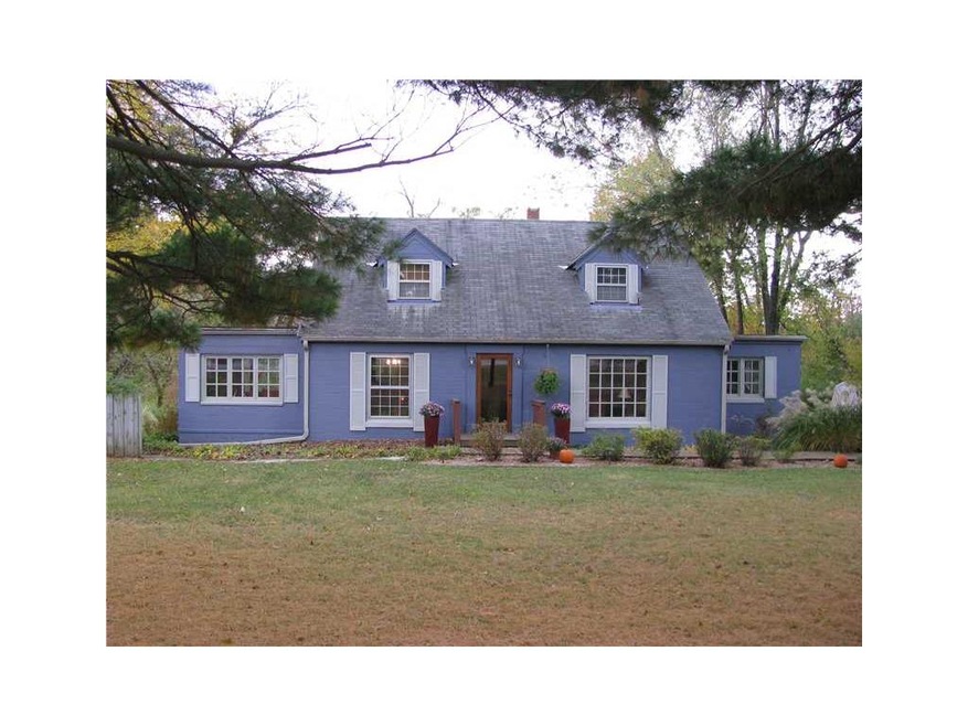 Front Exterior. Wonderful home with drive under ga