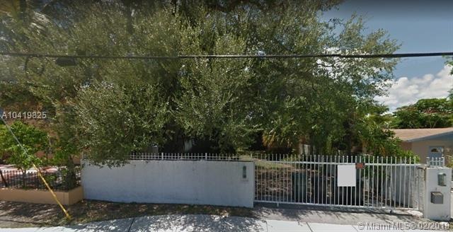 Property is fully walled with a security gate.